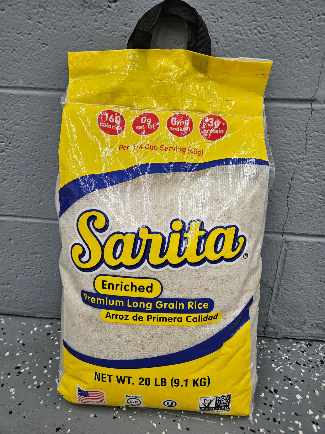 SARITA RICE  ENRICHED PREMIUM LONG GRAIN RICE ARROZ DE PRIMERA  CALIDAD  net WT 20 lb / 9.1 kg